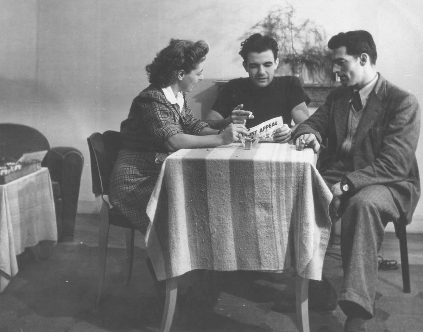 Jimmy Deane (right), discussing with Sylvia Cozer and Dumar.