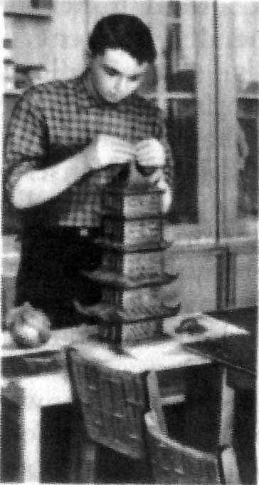 A senior pupil modelling a Japanese pagoda